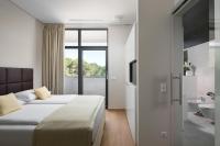 Posteľ alebo postele v izbe v ubytovaní Istra-Hvar Luxury Penthouse