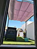Patio lub wspólna przestrzeń na świeżym powietrzu w obiekcie Javi s Home Trinidad