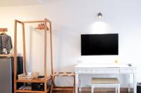 TV a/nebo společenská místnost v ubytování La Mai Hotel