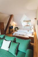 Łóżko lub łóżka w pokoju w obiekcie Hotel-Gasthof Weitgasser