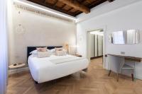 Posteľ alebo postele v izbe v ubytovaní Poēsis Experience Hotel