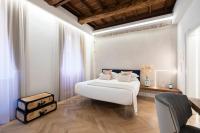 Posteľ alebo postele v izbe v ubytovaní Poēsis Experience Hotel