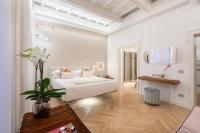Posteľ alebo postele v izbe v ubytovaní Poēsis Experience Hotel