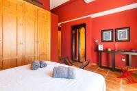 Postel nebo postele na pokoji v ubytování Villa Golf Sanlucar