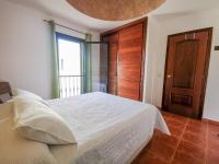 Postel nebo postele na pokoji v ubytování Paradise Villa
