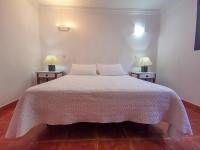 Postel nebo postele na pokoji v ubytování Paradise Villa