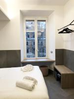 Posteľ alebo postele v izbe v ubytovaní Ottaviano Smart Rooms