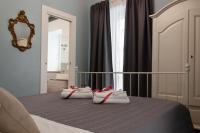 A bed or beds in a room at Real Giardinetto a Toledo