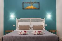 A bed or beds in a room at Real Giardinetto a Toledo
