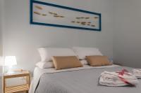 A bed or beds in a room at Real Giardinetto a Toledo