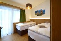 Posteľ alebo postele v izbe v ubytovaní Waidmannsruh Appartements