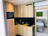 Kuchyňa alebo kuchynka v ubytovaní Szczyrk-Art Apartments