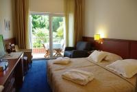 Łóżko lub łóżka w pokoju w obiekcie Hotel Villa Vera