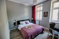 Posteľ alebo postele v izbe v ubytovaní Beżowy Apartament DE LUX dla 4 osób Chorzów Katowice