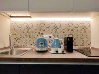 Kuchyň nebo kuchyňský kout v ubytování INTOMILAN Galleria Duomo I Boutique & Design Aparthotel