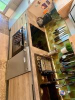 an overhead view of a kitchen with an open refrigerator at Cocoon vue Mer ☆ en face du Port de Golfe-Juan ☆ in Golfe-Juan