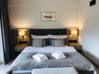 Posteľ alebo postele v izbe v ubytovaní Szczyrk-Art Apartments