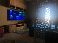 TV a/nebo společenská místnost v ubytování Stylish Pool view studio in Al Dau Heights