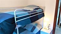 A bed or beds in a room at APT ALCAZABA by Malaga Picasso Rentals Selection