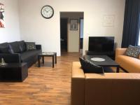 TV a/nebo společenská místnost v ubytování Old Town Boutique Apartments