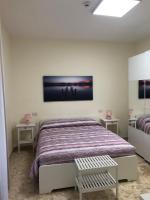 Posteľ alebo postele v izbe v ubytovaní B&b Il Bacio