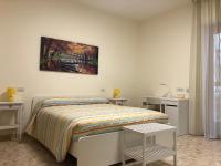 Posteľ alebo postele v izbe v ubytovaní B&b Il Bacio