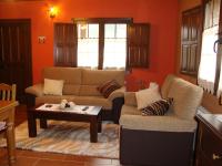 A seating area at Apartamentos Rurales Posada de las Hoces