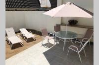 Patio alebo iná vonkajšia časť ubytovania ALOJAMIENTO CON JARDIN 20KM BARCELONA