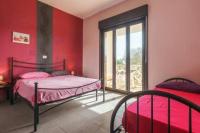 Posteľ alebo postele v izbe v ubytovaní Villa Vacanze Giuseppe