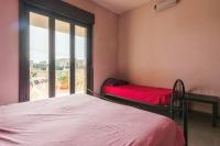 Posteľ alebo postele v izbe v ubytovaní Villa Vacanze Giuseppe