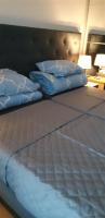 Posteľ alebo postele v izbe v ubytovaní Apartament 4 osobowy w Bel Mare
