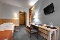 Postel nebo postele na pokoji v ubytování Hotel Leśny