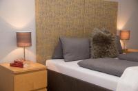 Łóżko lub łóżka w pokoju w obiekcie Apartment Erler