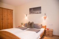 Łóżko lub łóżka w pokoju w obiekcie Apartment Erler