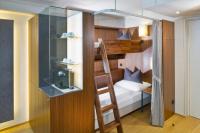 Łóżko lub łóżka w pokoju w obiekcie Hotel Maximilian - Stadthaus Penz