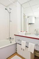 Ein Badezimmer in der Unterkunft S&eacute;jours &amp; Affaires Lyon Saxe-Gambetta