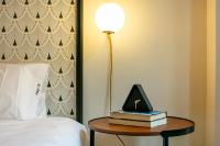 A bed or beds in a room at Luxury Belmont Puerta del Sol