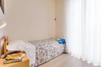 A bed or beds in a room at Hotel San Giorgio