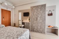 A bed or beds in a room at Hotel San Giorgio