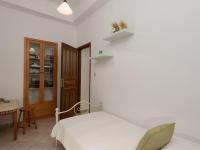 Postel nebo postele na pokoji v ubytování Aura Traditional Apartment