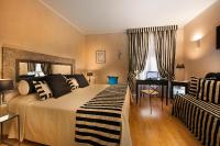 Posteľ alebo postele v izbe v ubytovaní Hotel Mastino