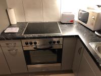 Kuchyň nebo kuchyňský kout v ubytování Apartment Laura