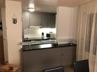 Kuchyň nebo kuchyňský kout v ubytování Apartment Laura