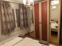 Postel nebo postele na pokoji v ubytování Apartment Laura