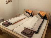 Postel nebo postele na pokoji v ubytování Apartment Laura
