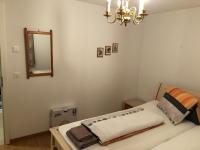 Postel nebo postele na pokoji v ubytování Apartment Laura