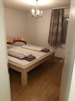 Postel nebo postele na pokoji v ubytování Apartment Laura