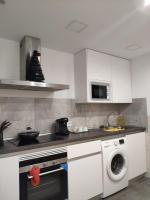 A kitchen or kitchenette at Cozy Apartment Malasaña FREE Parking