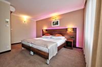 Postel nebo postele na pokoji v ubytování Hotel Leśny