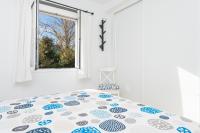 A bed or beds in a room at Apartamento Pinebeach